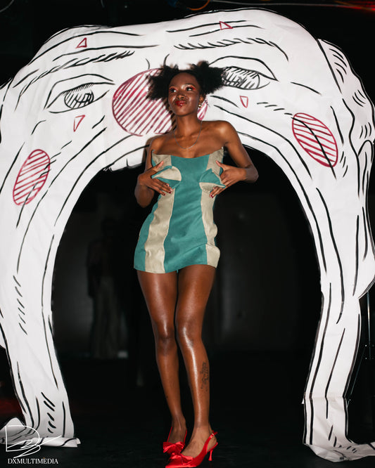 “Eyes up here” Cone Mini Dress